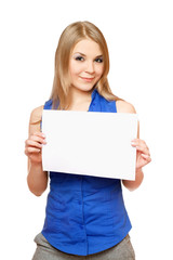 Fototapeta premium Beautiful young woman holding empty white board