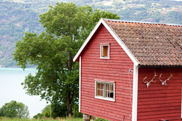 Obraz premium Hytte by lake