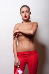 Fototapeta na wymiar attractive girl in red swimsuit