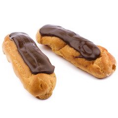 two chocolate eclairs on white background