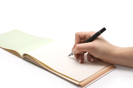 writting hend in a notebook