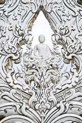 Fototapeta na wymiar White Buddha art in temple
