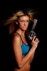 Woman halter top gun serious