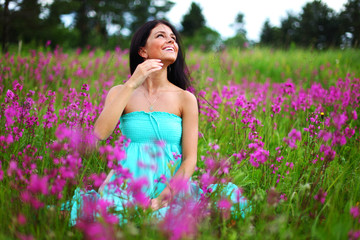 woman on pink flower field