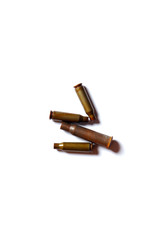 used gun's shells on white