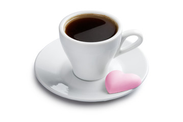 Cup of coffee with pink heart shape cookie