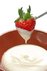 strawberry dipped in white chocolate fondue