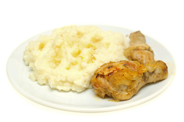 chicken and mashed potatoes on white