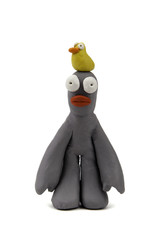 Plasticine man with bird on his head