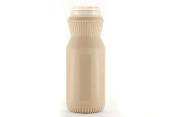 milk(coffee taste) in a plastic bottle on a white background