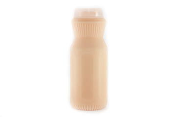 milk(tea taste) in a plastic bottle on a white background