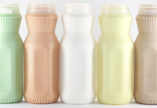 milk (many taste) in a plastic bottle on a white background