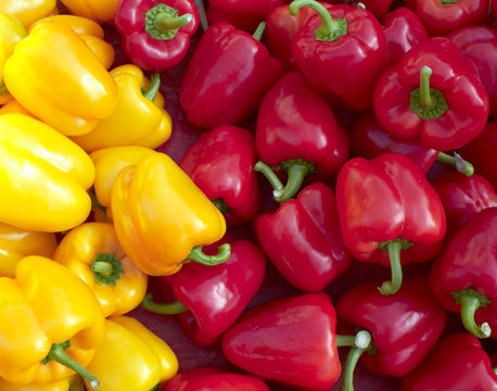 Fresh Red  And Yellow  Bell Peppers Closeup