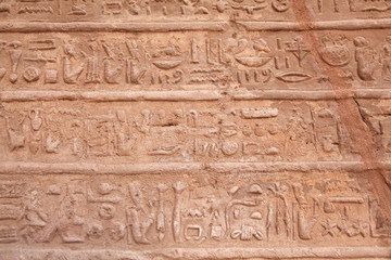 Fototapeta na wymiar Wall with ancient egyptian symbols in luxor