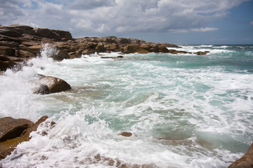 Fototapeta na wymiar Wild water at coast of Brittany, France