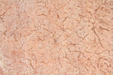 Red sandstone texture. Surface of red sandstone. Tacao color.