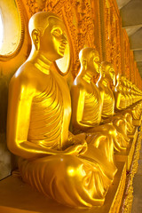 Golden monk statues in Mahajadee Chaimongkol temple