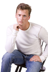 white man sitting on chair relaxed