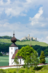 Fototapeta na wymiar church in Zehra and Spissky Castle at background, Slovakia