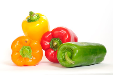 Bell peppers of different colors isolated on white background. 