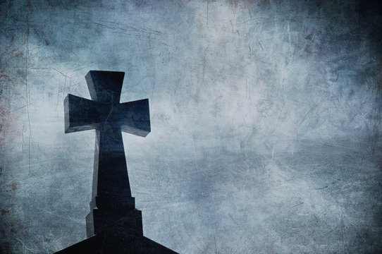 Grunge image of a cross in the cemetery, perfect halloween backg
