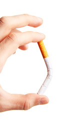 The hand hold a cigarette. Harm of smoking