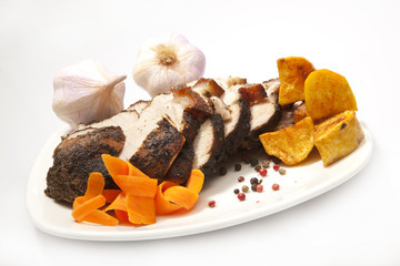 SCHWEINEBRATEN UND KNOBLAUCH