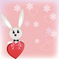 The toy rabbit holds heart