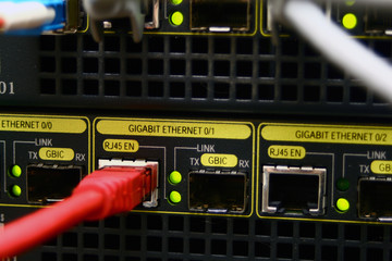 Red ethernet cable connected at gigabit speed