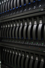 Three lines of hard disks in a data center