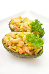 Prawn and avocado salad against white