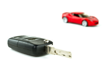 Key to new car isolated on white