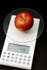Apfel auf Waage