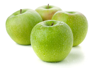 Four ripe green apples