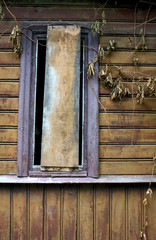 Background - the broken window in the old house