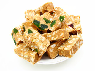 Peanut brittle isolated on white background