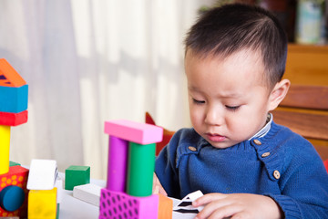 child with blocks