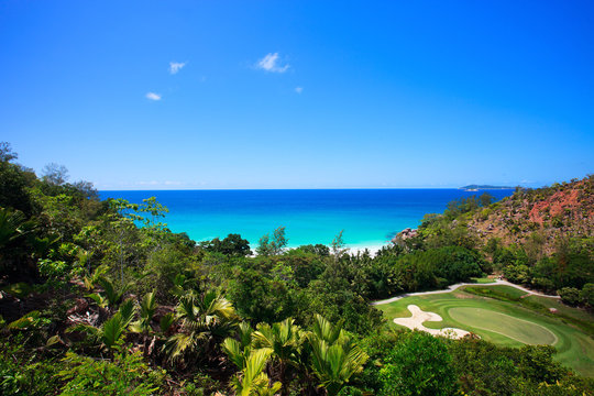 Fototapeta Tropical beach and golf field