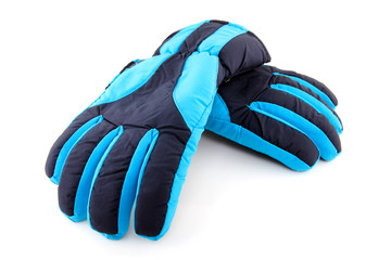 pair of blue ski gloves over white background