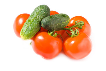 Tomatoes and cucumbers isolated