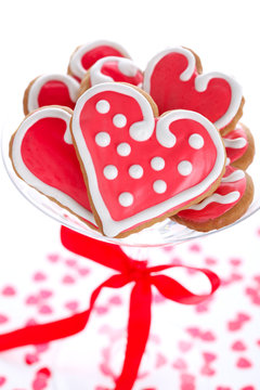 Heart-shaped biscuits for Valentine's Day with red ribbon