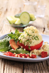 Couscous stuffed tomato