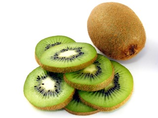 Sliced & whole kiwi fruits on a white background