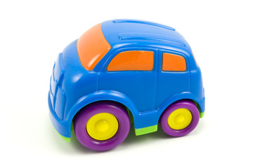Fototapeta na wymiar colorful plastic car on a white background