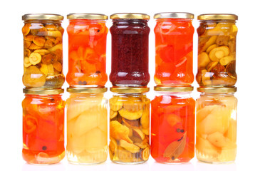 Preserved vegetables on white background