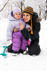 Mother and daughter outdoor in winter