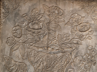 ancient flower engrave on wall