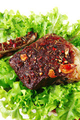 served beef meat on salad