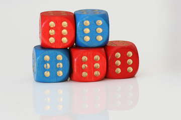 Arrangement of old wodden dice on white background