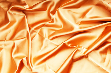 Bright satin fabric folded to be used as background